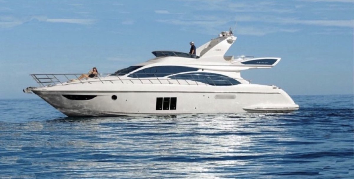 Azimut 58 Flybridge side profile underway off Marbella