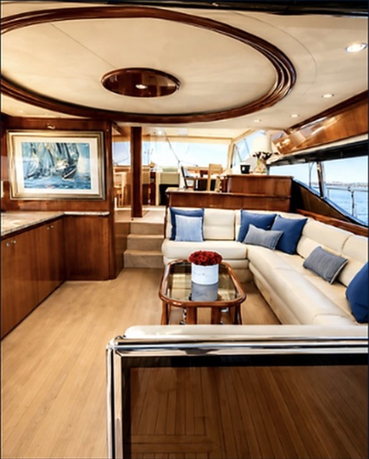 Ferretti 680 saloon with wood finish and wraparound seating