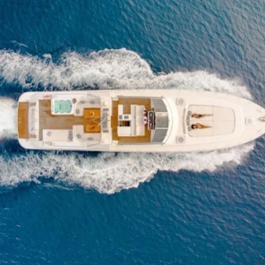 Mangusta 80 aerial wake shot — luxury yacht private charter Costa del Sol