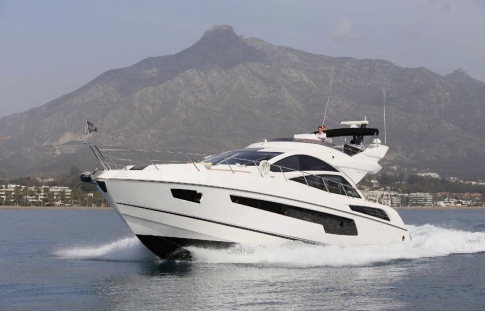 Sunseeker 68 Sport motor yacht charter off Marbella, Puerto Banús