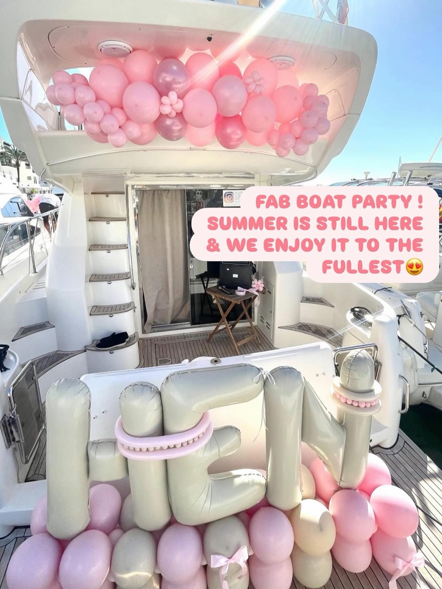 HEN balloon letters on the yacht stern at Puerto Banús
